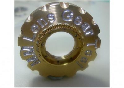 Brass camera drive gear and gear mounting tool for Inuktun.